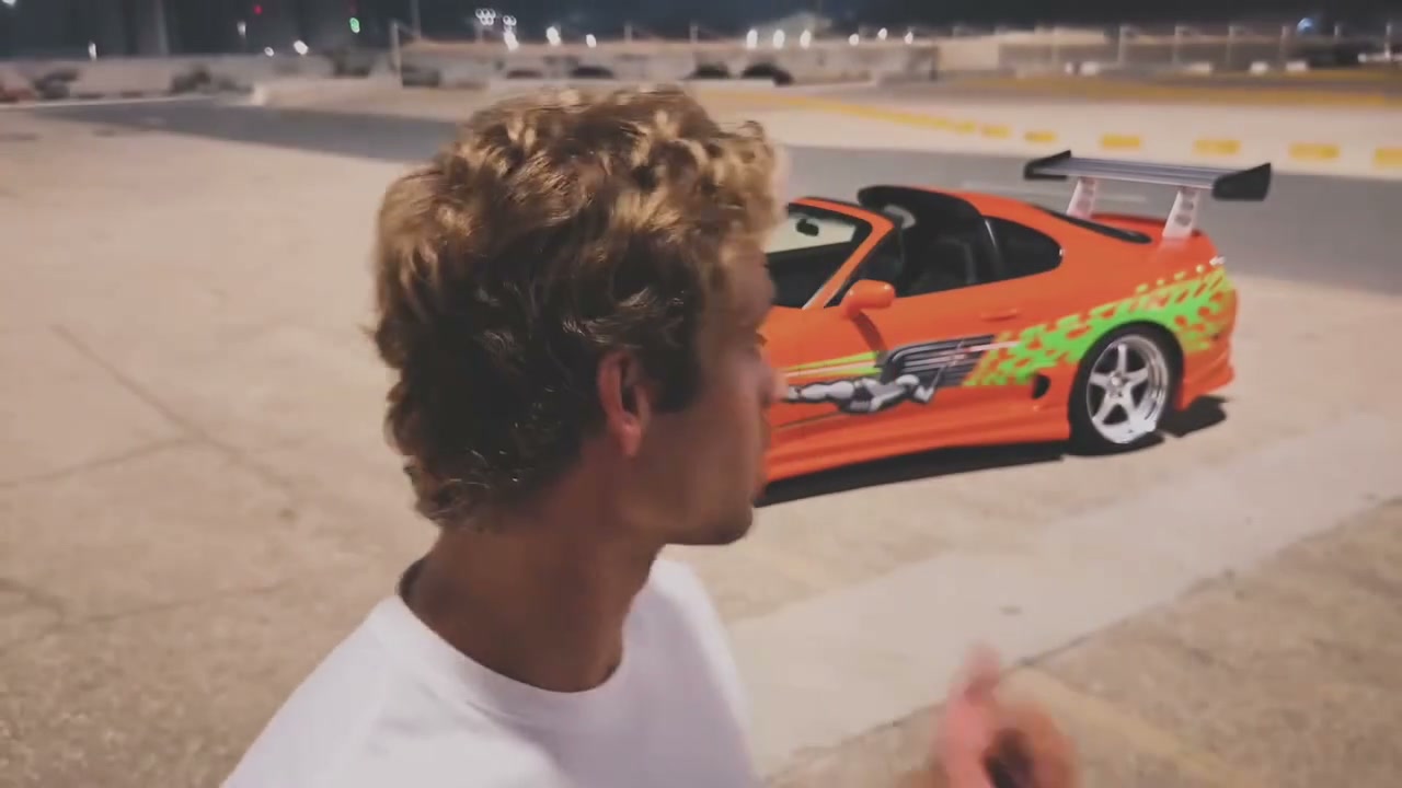 The person and the car are the only required pictures
